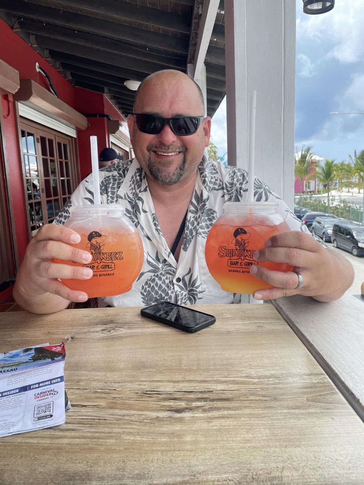 Jared holding tropical drinks